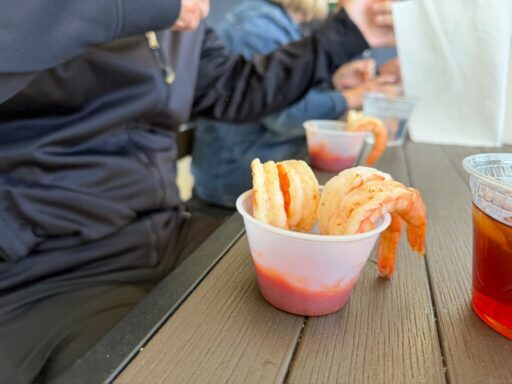 Guests enjoying fresh shrimp off the boat at the Crab Plant on a Crystal River food tour