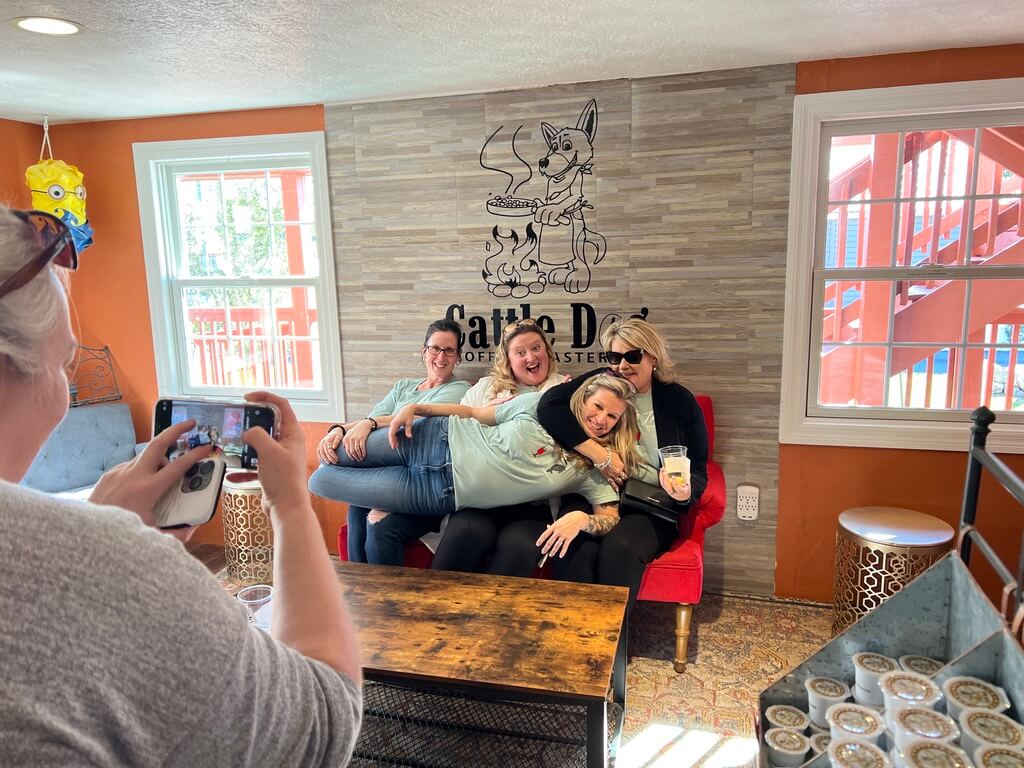 Group tour of women posing for photos and enjoying a Crystal River food tour experience