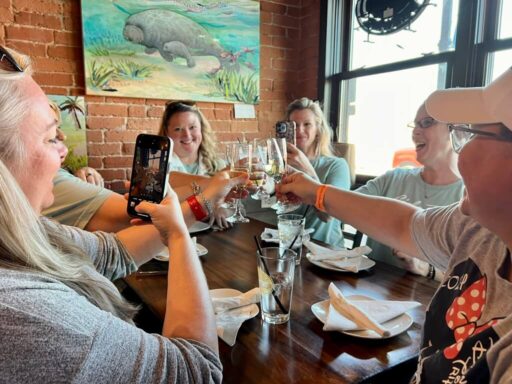 Group of women traveling to Crystal River for manatee season enjoying a local food tour experience