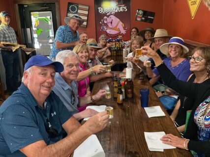 Crystal River food tour featuring slow-smoked barbecue and local beer at BubbaQue’s restaurant with signature sassy decor