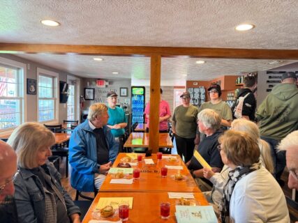 Guests enjoying a four-course tasting at Cattle Dog Coffee Roasters by a World Food Championships chef on a Crystal River food tour